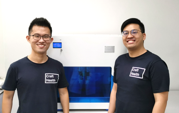 Craft Health Pte Ltd founders: Dr. Wei Jiang GOH (right) and Dr. Seng Han LIM (left) beside CraftMake™, one of the world's first 3D printers for pharmaceuticals that do not involve heat or UV curing