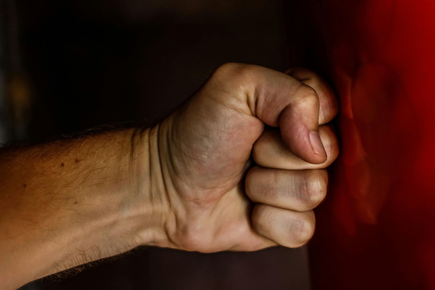 Fist that punches boxing target.