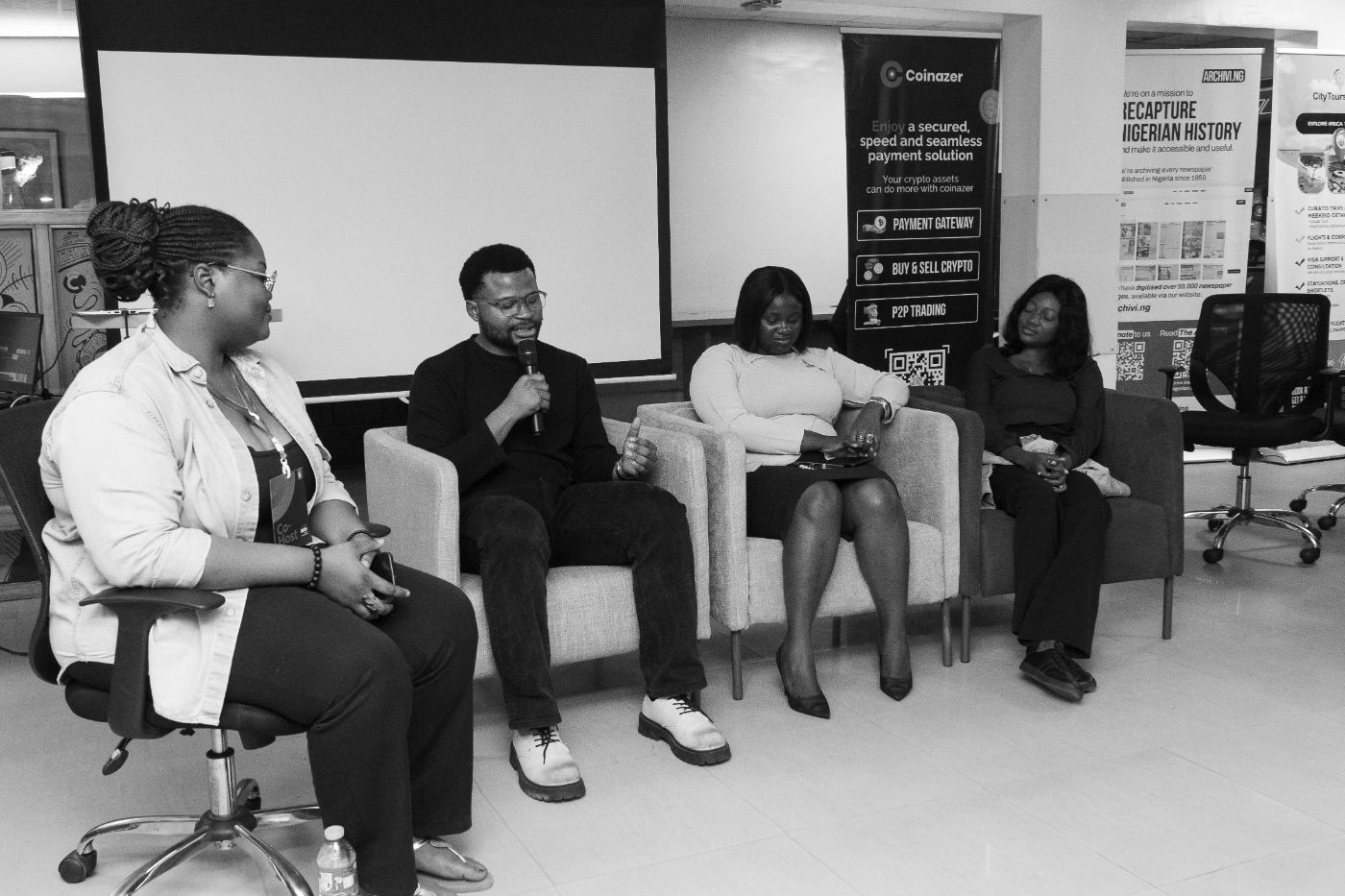 Asher Umerie with panelists at AIESEC in Nigeria's IYD 2025 Event. 