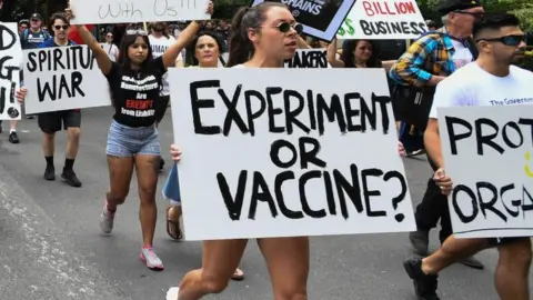 Anti-vaccination protests held in Australia ahead of rollout