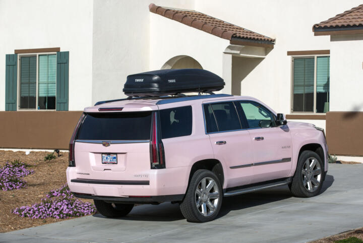 A pink Mary Kay Cadillac Escalade is parked in the driveway of a home in Menifee, California. Credit:George Rose/Getty Images