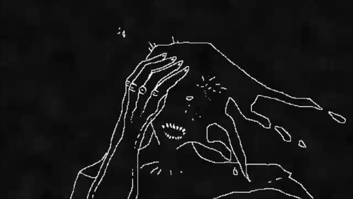 Our nameless protagonist writhes in headache-induced pain.