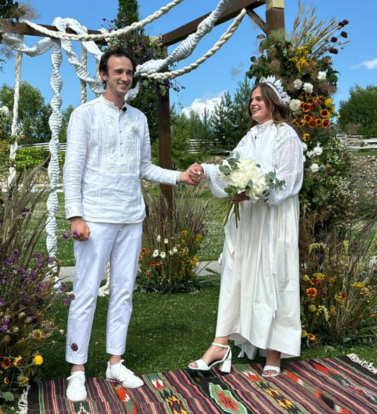 Dimko and his wife at their wedding