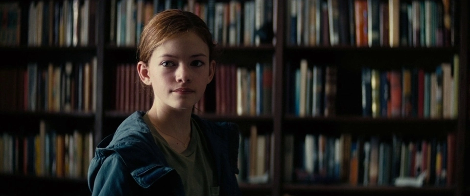 The young Murph in front of the “coupled” (?) library, Interstellar