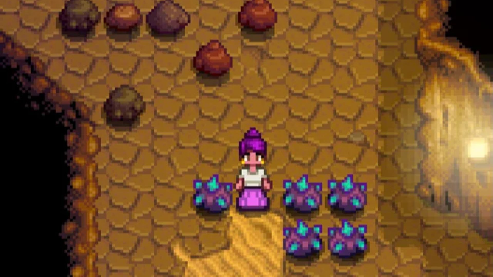 Finding iridium ore while exploring the Skull Cavern in Stardew Valley.