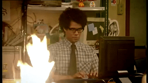 A gif of programmer with a burning computer. Source: giphy.com