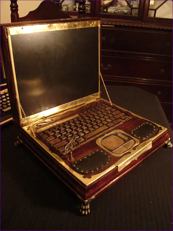 Datamancer Steampunk laptop. From https://www.geeknative.com/21147/the-datamancers-impressive-steampunk-laptop/