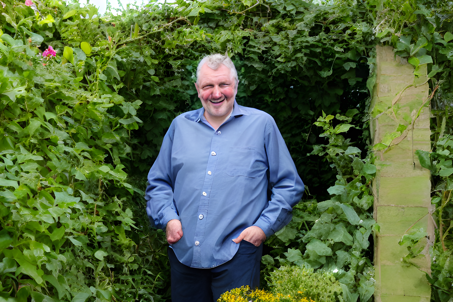 landlord looking happy in his walled garden