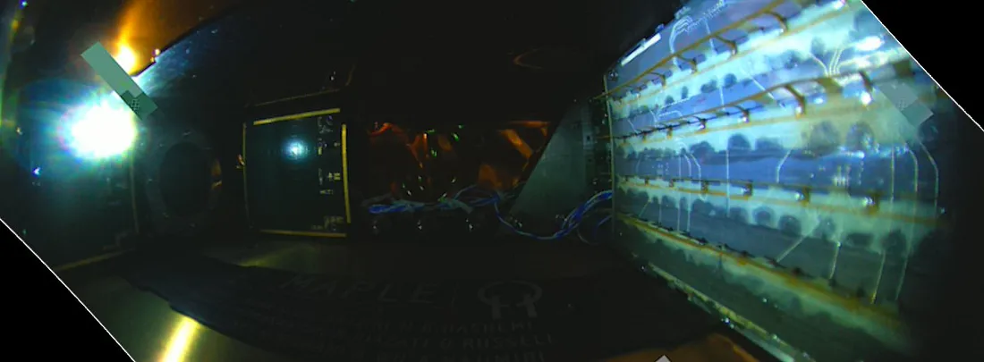 Photo from the space of the interior of MAPLE, with the transmission array to the right and the receivers to the left. Credit: SSPP