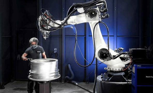 The process of printing Terran R rocket parts at a presentation