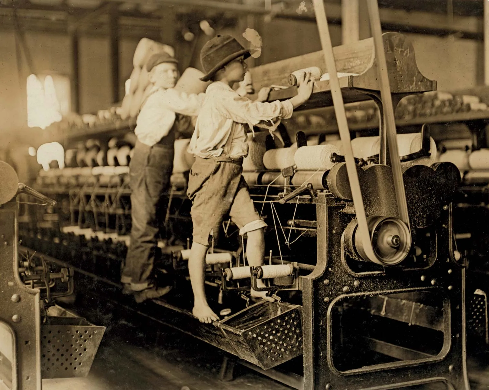 Young boys working in a thread-spinning mill, Macon, Georgia, 1909. Child labor was widespread after the Industrial Revolution.