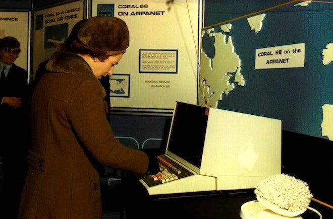 The Queen sends an email from a computer terminal in Malvern, England. Photo Peter Kirstein