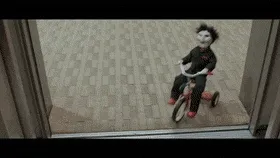 Клоун из пилы на велосипеде. Игра jigsaw feeling