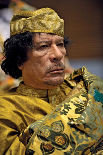 Libyan dictator Muammar al‑Qaddafi is killed