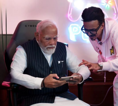 Prime Minister Narendra Modi gaming with Animesh Agarwal, CEO and Co-founder of 8Bit Creatives